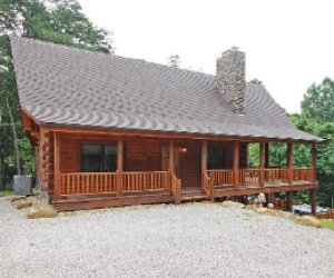 log cabin with side deck and jacuzzi