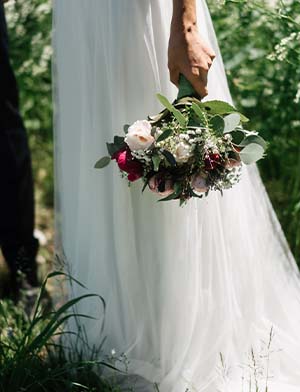 holding flowers